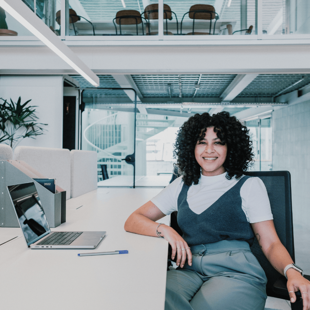 NI Increase: Image of a lady in HR sitting at her desk