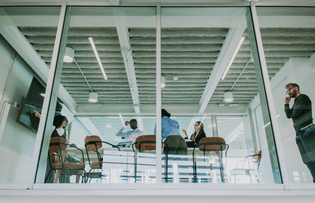 NI Increase: Upwards view of a meeting room with clear glass panels