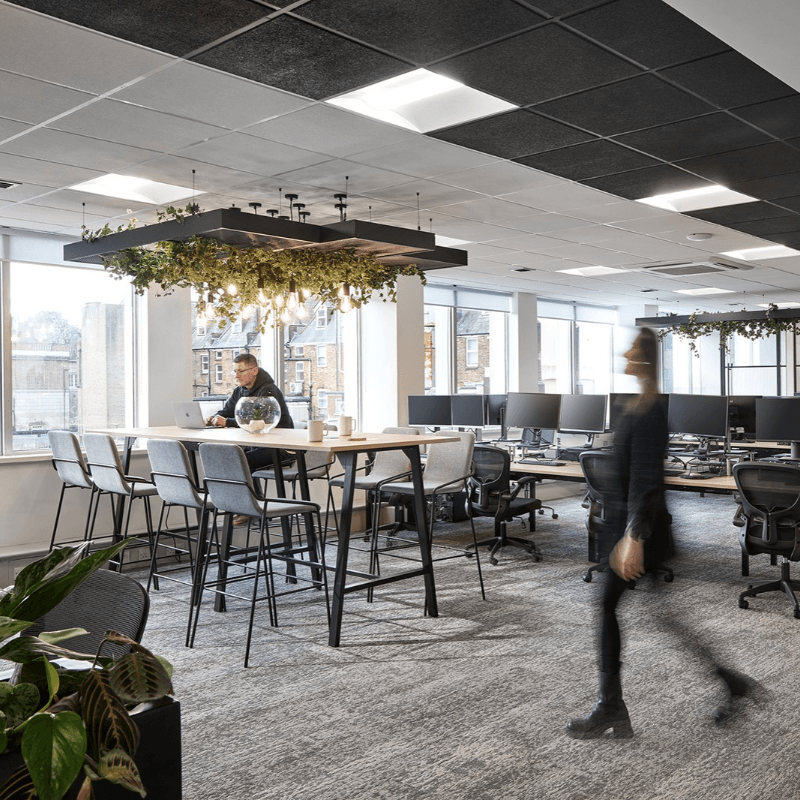 Photo of the Platinum Employment office with blurred images of people working